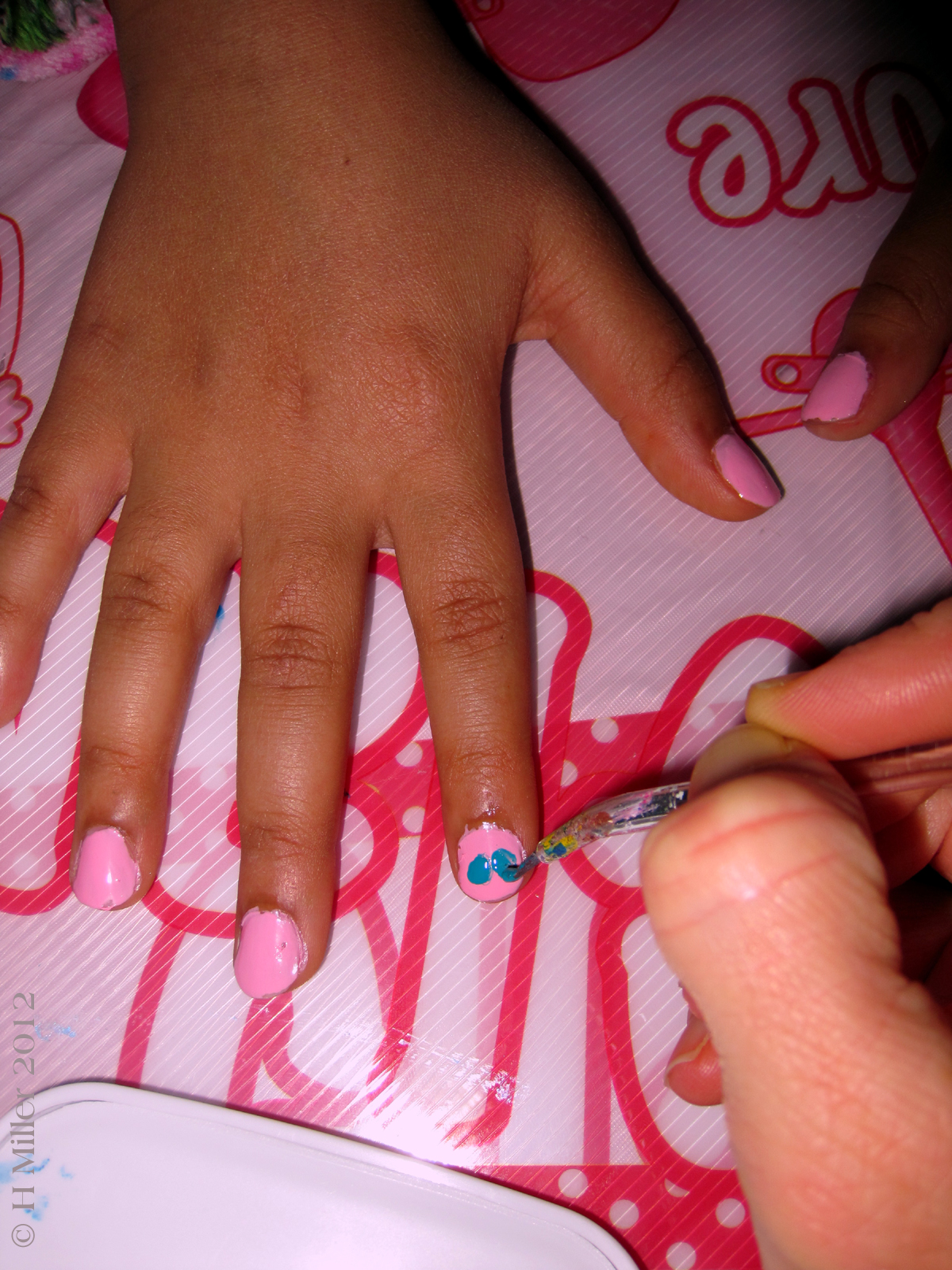 Beginning the custom nail art butterfly design manicure